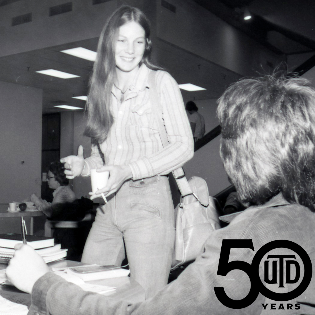 Old photo of students in McDermott Library cafeteria