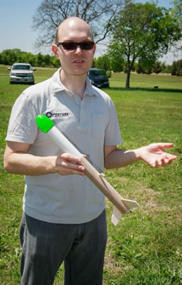 Physics graduate student Ed Graef explains model rocket science.